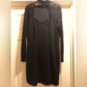 Solid black party dress by Boohoo dress with lace sleeves.